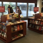Patrons around the Banned Books display in Lockwood Memorial Library. 