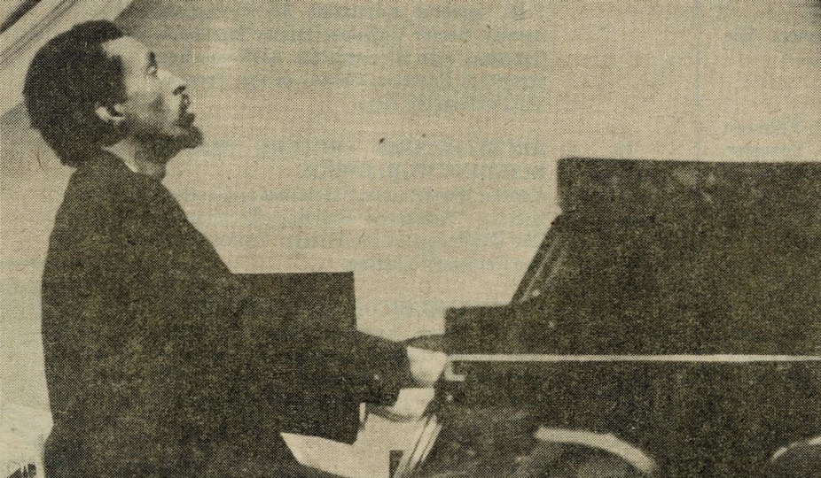 Photo of Julius Eastman playing the piano. 