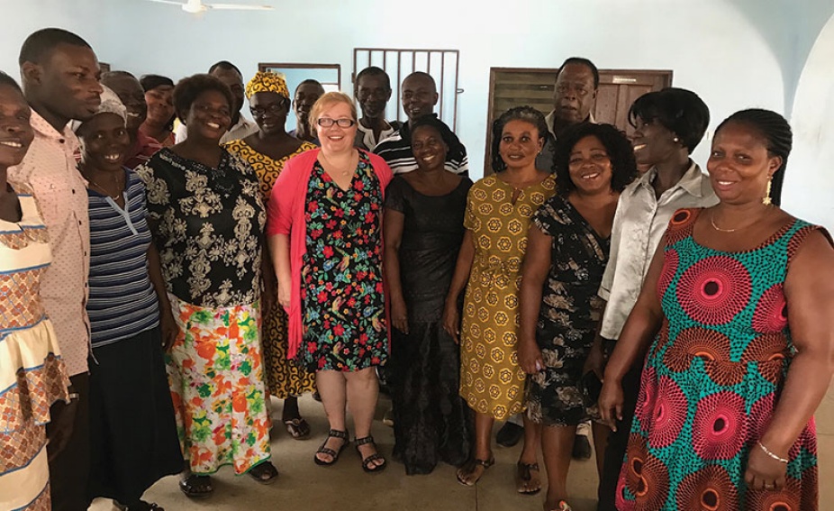Photo of Cindi Tysick with a group of volunteers in Ghana. 