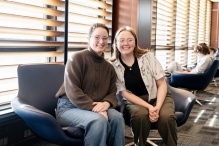 Lilly and Hayden in the Grand Reading Room on the third floor of Silverman Library. 