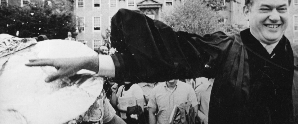 University President Robert Ketter throws a pie. 