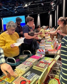 Participants browse the banned books display. 