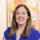 Carolyn Klotzbach-Russell poses for a headshot. 