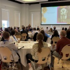 Attendees gather in Harriman Hall for the annual meeting. 