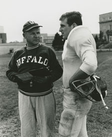 Head Coach Dick Offenhamer with player